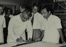 Mr. V. R. Nedunchezhian signs the visitor’s book at the Central Workshop