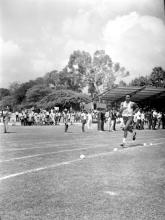 An athlete cruising through the lane during a track event, 1970
