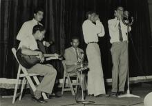 The students perform a musical piece at the Third Institute Day 