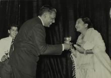 Mrs. Shanti Sengupto  hands over  a prize to Mr. Y. S. Ramaswamy