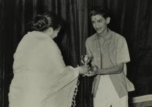 Mrs. Shanti Sengupto hands over a prize to Mr. C. V. Sahasranamam