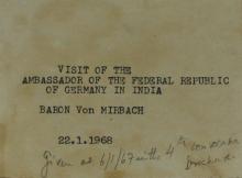 The label attached to the photograph album cover which is preserved in the Heritage Centre