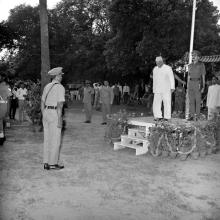 The chief guest, Dr. V. V. Giri prepares to take the salute after inspecting the guard of honour 