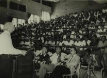 Dr. Linus Pauling addressing an audience in a packed hall at IIT Madras, 1967