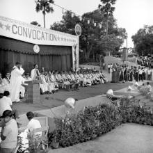 A student approaches the dais to receive his degree, 1971