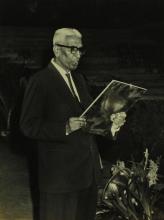 Prof. R. Krishnamurthi (Head of the Department of Humanities) addresses the gathering at the farewell ceremony organised for Mr. R. Natarajan 