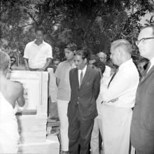 A priest conducts the ceremonial rites in front of the foundation stone