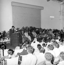 A student representative addresses the audience at Dr. A. L. Mudaliar’s farewell function