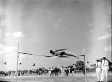 High jump event in progress during the Third Inter-IIT Sports Meet, 1964
