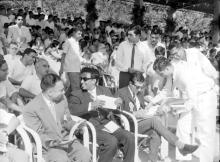 Mansoor Ali Khan, the Nawab of Pataudi, apparently signing autographs at the Third Inter-IIT Sports Meet, 1964