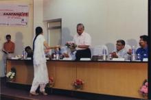  Prof. V. G. Idichandy receives a bouquet from a student at Saarang, 2005
