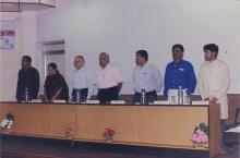 Guests rise for the Invocation at the Saarang inauguration, 2005