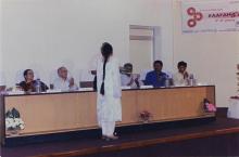 Mr. K. S. Sarma ( I.A.S.) receives a bouquet of flowers from a student at the inauguration of Saarang, 2005