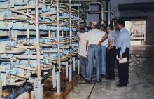 Prof. M. S. Ananth and others taking a look at equipment, 2003