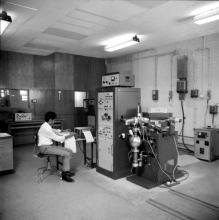 A student operating equipment