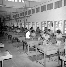 Students working on assignments at the Fitting Shop