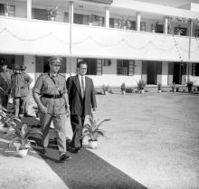 Major General Virendra Singh is escorted by Prof. B. Sengupto during the inauguration of the NCC building, 1965