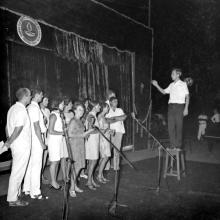 German campus residents performing a musical piece