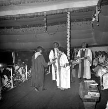 A student receives his award from the chief speaker of the eleventh convocation, Mrs. Indira Gandhi 