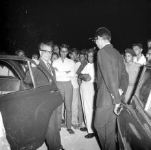 Prof. B. Sengupto is welcomed at the entrance of the Open Air Theatre (OAT) at his farewell function, 1967
