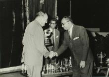 Dr. Karl Pfauter giving away a prize to Mr. S. S. Mani at the Ninth Institute Day celebrations at the Open Air Theatre, 1968