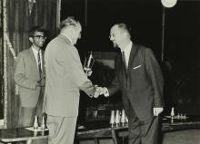Dr. Karl Pfauter giving a prize to Prof. Hans Wagner at the Ninth Institute Day celebrations at the Open Air Theatre, 1968