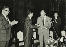 Prof. A. Ramachandran presenting a magazine to Dr. Karl Pfauter at the Ninth Institute Day celebrations at the Open Air Theatre, 1968