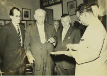 Prof. B. Sengupto showing the guests an object of interest during the visit of H. E. Theodor Heuss, 1960