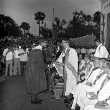 A prize winner shakes hands with the chief guest of the eighth convocation, Prof. M. G. K. Menon