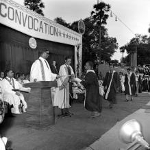 A graduate receives his degree from Prof. A. Ramachandran