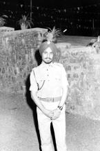 A person stands for a photograph during the Sixth Institute Day, 1965