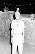 A person stands for a photograph during the Sixth Institute Day, 1965