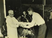 Mr. M. Bhaktavatsalam presents a prize to a student during the Sixth Institute Day, 1965
