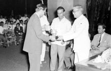 Mr. R. Venkataraman hands over a trophy to Prof. R. G. Narayanamurthi, 1964