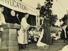 A graduate receives her degree from Prof. A. Ramachandran 