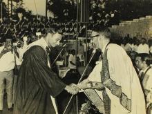 Mr. Satish Ramadhyani, the recipient of the President of India Prize, shakes hands with the chief guest of the eighth convocation, Prof. M. G. K. Menon 