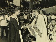 A prize winner shakes hands with the chief guest of the eighth convocation, Prof. M. G. K. Menon