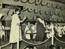 A student bows to the chief guest, Mrs. Indira Gandhi, before receiving her degree from  Prof. K. A. V. Pandalai 