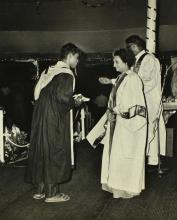 A student receives a prize from Mrs. Indira Gandhi 