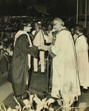 Mr. P. N. Haksar presents a degree to a graduand, 1975