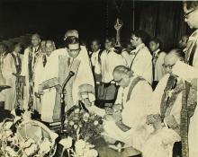 Mr. P. N. Haksar signs the register of degrees at the 12th Convocation, 1975