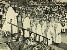 The academic procession climbs the stage, 1975