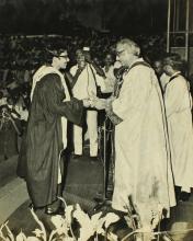 Mr. P. N. Haksar presents a degree to a graduand, 1975