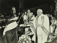 A students receives her award from the chief guest, Dr. V. V. Giri (President of India)