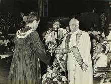 A students receives his award from the chief guest  Dr. V. V. Giri 