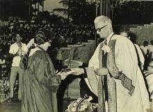 Dr. Malcolm S. Adiseshiah presents a degree to a graduand, 1972