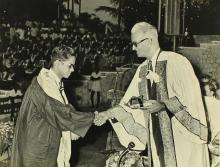 Dr. Malcolm S. Adiseshiah presents a degree to a graduand, 1972