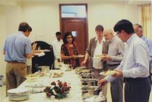 Faculty and delegates at lunch, 2006