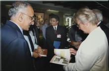 Dr. Annette Schavan takes a look at a 'Glimpses of Heritage' booklet, 2008