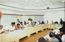 A press conference in progress, 2008